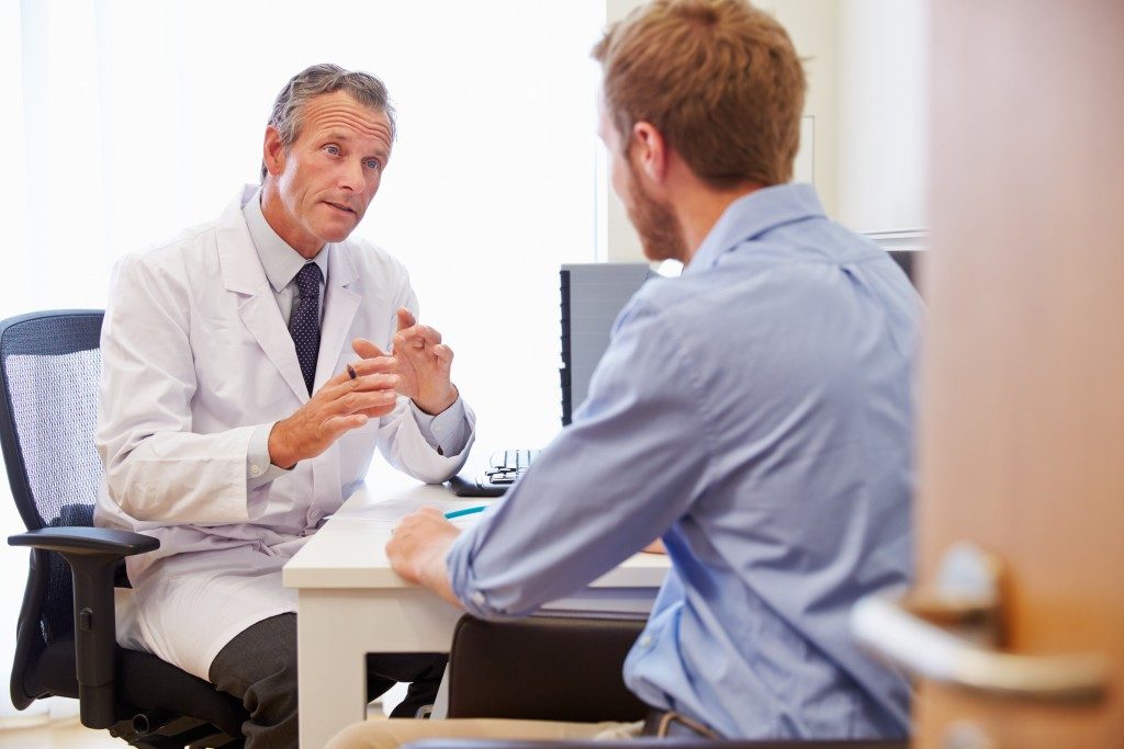 Doctor with patient consultation