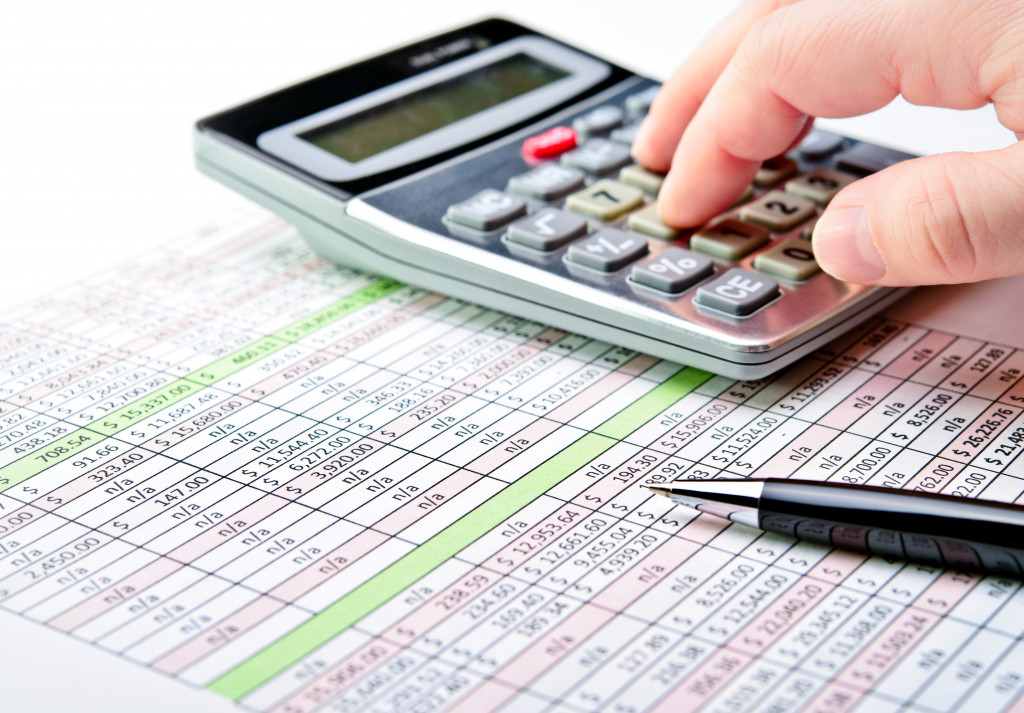 Business owner calculating tax