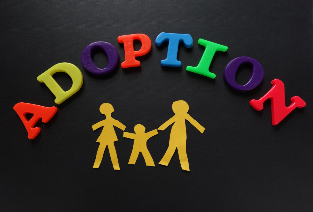 Colorful letters spelling the word ADOPTION